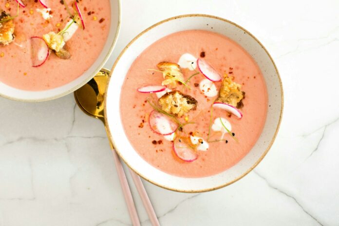 Photo by Bakd&Raw by Karolin Baitinger a bowl of soup with chopsticks